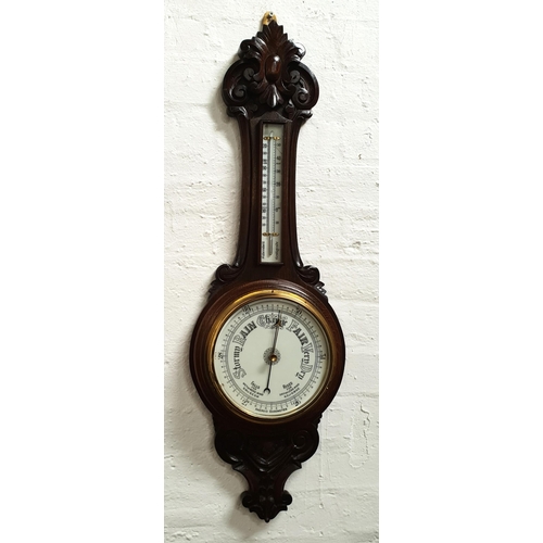 ENGLISH OAK HALL BAROMETER
circa 1930s, the scroll shaped case with relief carving, aneroid movement, 90cm high