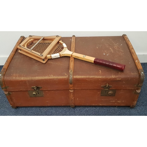 290 - VINTAGE TRAVEL TRUNK
with brown canvas body and wooden ribs, internally in brown pattern paper, with... 