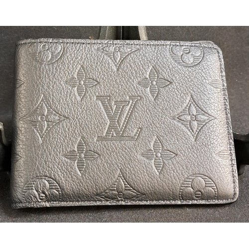 314 - LOUIS VUITTON BLACK CALFSKIN WALLET
in Monogram Shadow calfskin