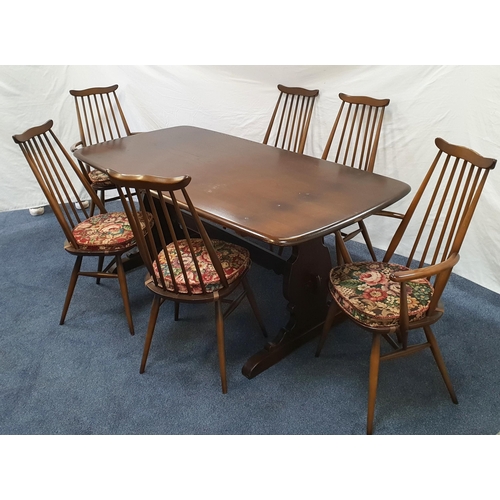 387 - ERCOL OLD COLONIAL REFECTORY TABLE AND SIX ERCOL WINDSOR GOLDSMITH CHAIRS
in stained Beech and Elm, ... 