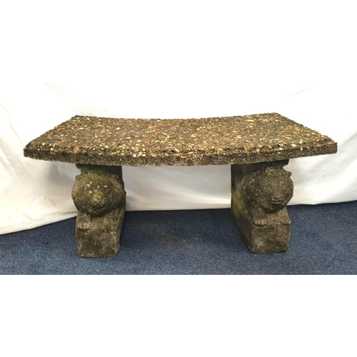 401 - CONCRETE LION BASED CURVED GARDEN BENCH
the two supports formed as lions below a curved composite pe... 