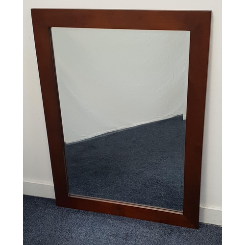 415 - LARGE CONTEMPORARY HARD WOOD FRAMED BEVEL EDGED MIRROR
of a red brown colour, 76 x 96cm