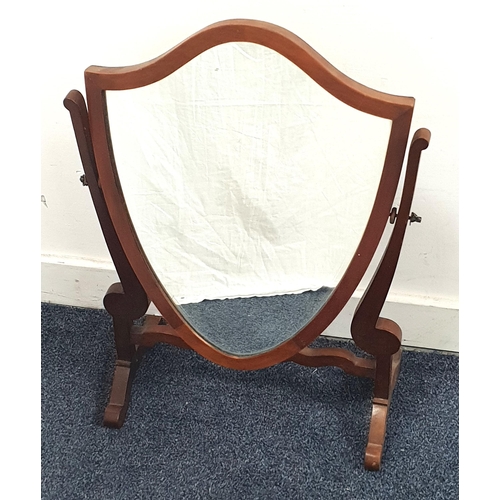 487 - MAHOGANY FRAMED SWING DRESSING MIRROR
of shield shape, 61 x 44 x 21cm