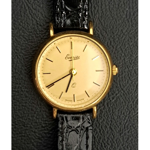 22 - LADIES NINE CARAT GOLD CASED EVERITE WRISTWATCH
the circular dial with baton five minute markers