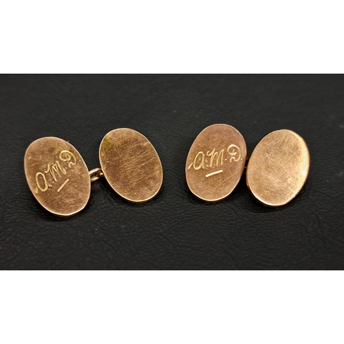 10 - PAIR OF NINE CARAT GOLD CUFFLINKS
with engraved monogram 'AMD', total weight approximately 9 grams