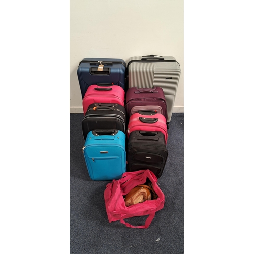 29 - SELECTION OF EIGHT SUITCASES AND TWO HOLDALLS
including Constellation, Swift, American Tourister and... 