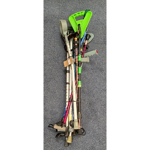 45 - SELECTION OF THIRTEEN WALKING AIDS AND WALKING STICKS