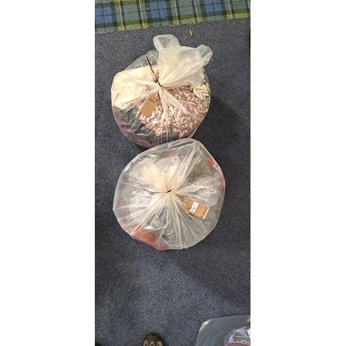 TWO BAGS OF LADIES CLOTHING ITEMS
including M&S, Zara, Ralph Lauren, North Face and LL Bean, etc.