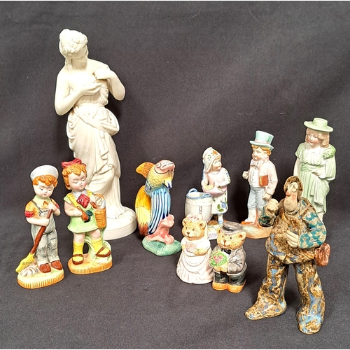 SELECTION OF FIGURE ORNAMENTS
including two Fairylite figures of children, a Garnier fish decanter, Continental figurines, and a bear bride and groom salt and pepper (10)