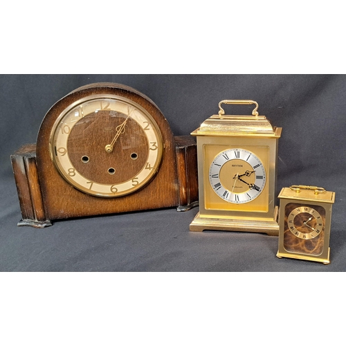 316 - OAK CASED MANTEL CLOCK
with later replacement battery operated movement, together with two further g... 