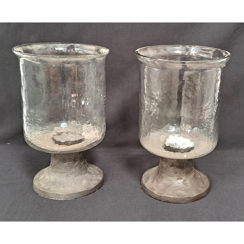 542 - PAIR OF CONTEMPORARY GLASS AND METAL CANDLE HOLDERS
dappled glass on bronzed circular feet, 40cm hig... 