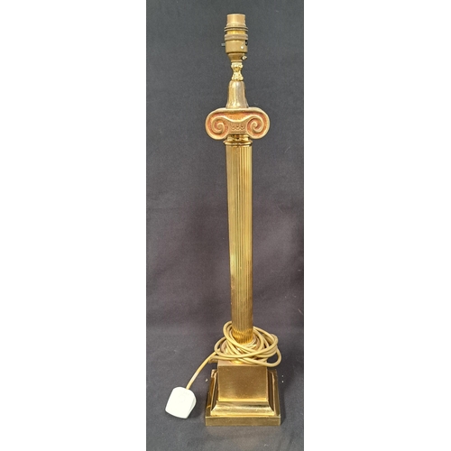 553 - BRASS IONIC COLUMN TABLE LAMP
raised on stepped square base, 60cm high (excluding fitting)