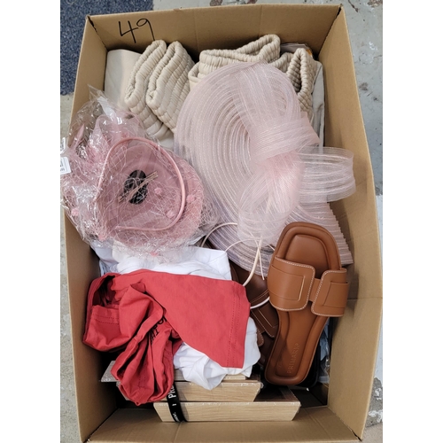 49 - ONE BOX OF NEW ITEMS
including: clothes, picture frames, ladies sandals and ladies hats