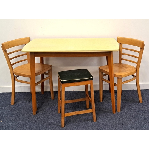 567 - RETRO FORMICA TOPPED TABLE BY CENTA
with yellow Revelite (Formica) top raised on beech supports, lab... 