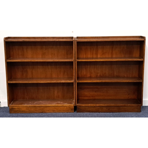 603 - PAIR OF 1930s OPEN OAK BOOKCASES
of tapered form, 91 x 102 x 25cm (2)