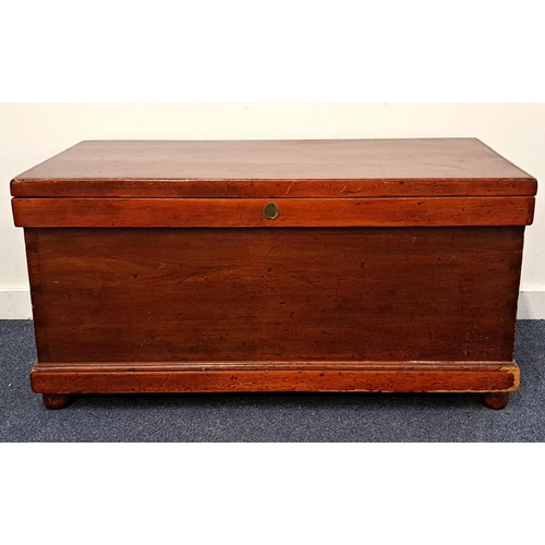 605 - LARGE STAINED PINE CHEST
stained a dark red colour, the interior with drawer compartments, with blac... 