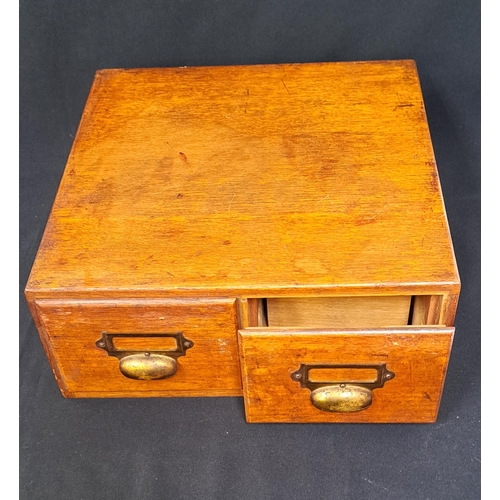 583 - VINTAGE OAK INDEX CARD FILING CABINET
with two drawers and brass handles and tag holders, 39 x 16 x ... 