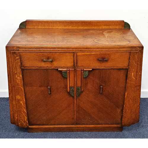 594 - ART DECO OAK SIDEBOARD
with two drawers over two door cupboard, the interior of light oak, two side ... 