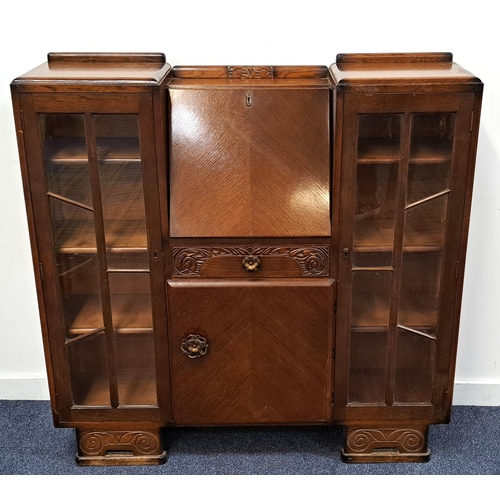 600 - 1930s OAK HAND CARVED SIDE BY SIDE BUREAU BY SCULLY
the bookcase/display cabinets with glazed doors ... 