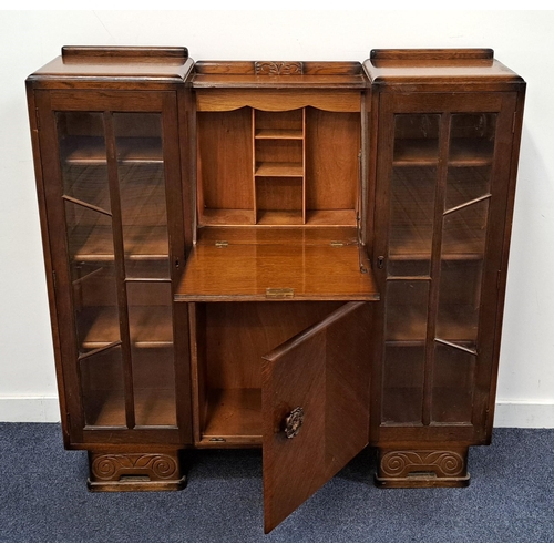 600 - 1930s OAK HAND CARVED SIDE BY SIDE BUREAU BY SCULLY
the bookcase/display cabinets with glazed doors ... 