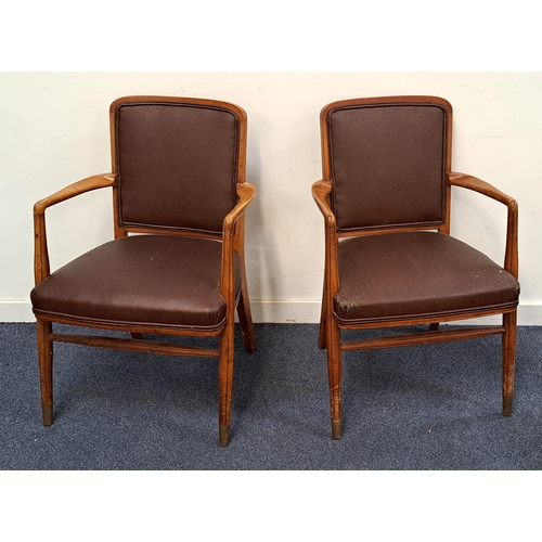 607 - PAIR OF MID CENTURY TEAK ARM CHAIRS
the fluted legs with brass end, with curved arms and brown leath... 