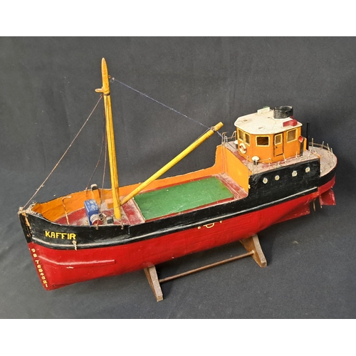 357 - MODEL MOTORISED KAFFIR PUFFER BOAT
Kaffir on the side with red base on stand, 33 x 46 x 13cm