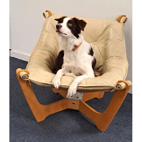 629 - ODD KNOTSEN STYLE LUNA CHAIR FOR JOHN LEWIS
with laminated wooden frame and cream leather and button... 