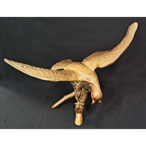 396 - LARGE BRASS EAGLE
with outstretched wings on branch, 63cm wingspan