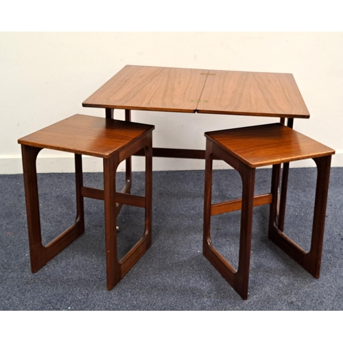 636 - MID CENTURY MACINTOSH TEAK NEST OF TABLES
the larger table with swivel top raised on casters, with t... 