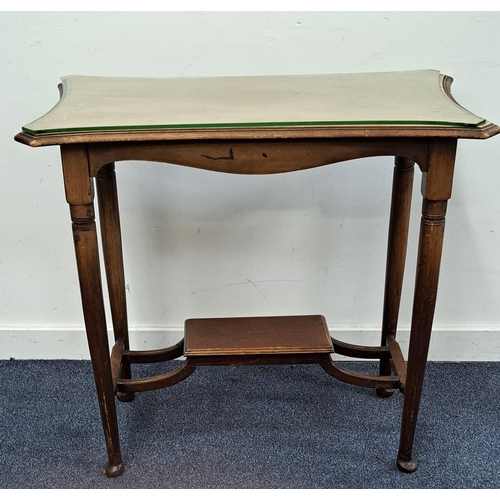 638 - MAHOGANY SIDE TABLE
the shaped top raised on tapering supports with pad feet united by an undertier,... 