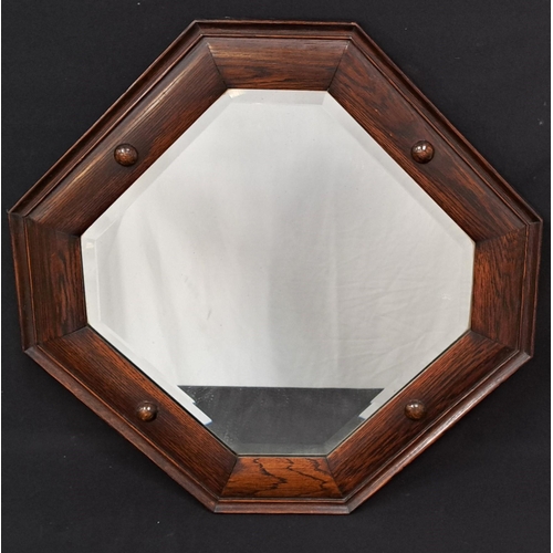 641 - 1930s OCTAGONAL OAK FRAMED BEVEL EDGED WALL MIRROR
with dot decoration, 60 x 60cm