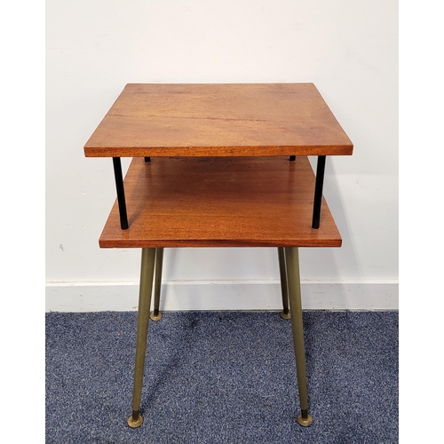 643 - MID CENTURY TEAK TWO TIERED OCCASIONAL TABLE
on gold tapered legs with brass circular feet, 41 x 66 ... 