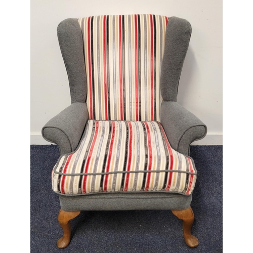 644 - WING BACK ARM CHAIR
newly upholstered in grey with striped cushion and back, on mahogany legs, 74 x ... 