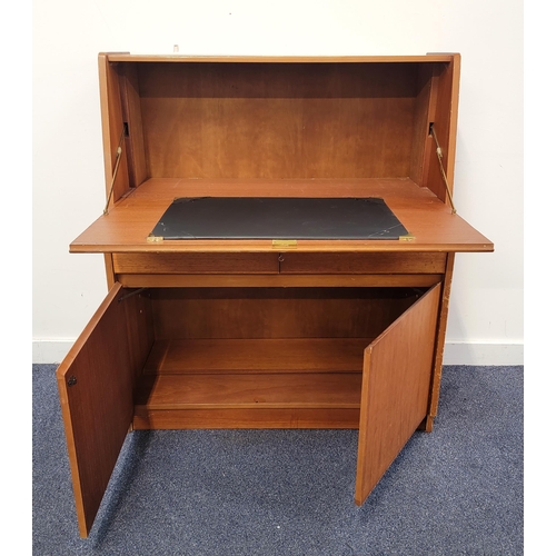 646 - MID CENTURY REMPLOY TEAK BUREAU
the fold out lid with leather insert for writing, with two drawers a... 