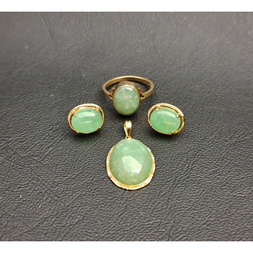 21 - SUITE OF JADE SET JEWELLERY
comprising a ring in nine carat gold and a pair of earrings and pendant ... 