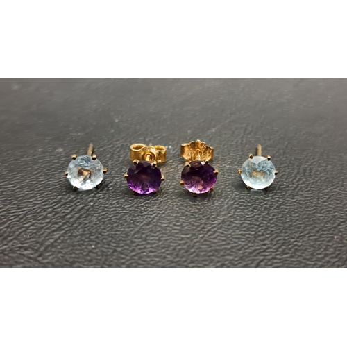 84 - TWO PAIRS OF GEM SET STUD EARRINGS
comprising a pair of aquamarine and a pair of amethyst, all the g... 