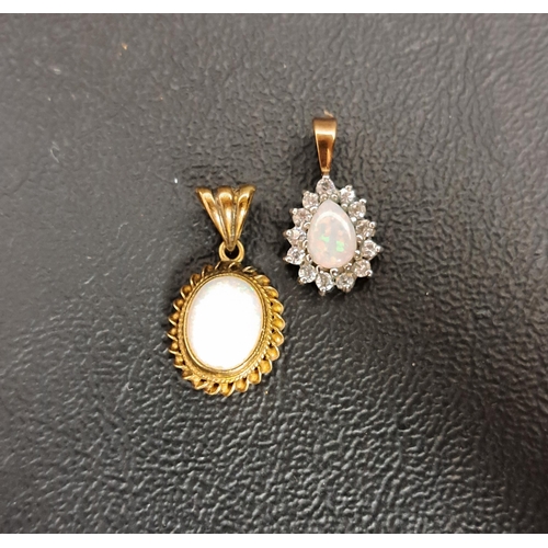 86 - OPAL PENDANT
the oval cabochon opal measuring 9.4mm x 7.1mm, in nine carat gold mount; together with... 