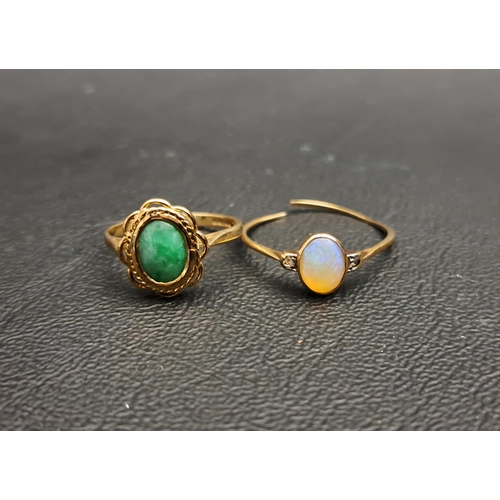 115 - TWO STONE SET RINGS
comprising a jade ring on nine carat gold shank with pierced setting, ring size ... 