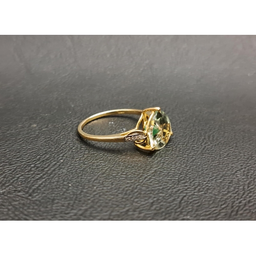 116 - QUASAR CUT QUARTZ DRESS RING BY LEHRER
with central green stone section, with small diamonds to the ... 