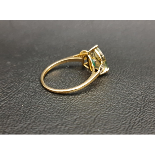 116 - QUASAR CUT QUARTZ DRESS RING BY LEHRER
with central green stone section, with small diamonds to the ... 