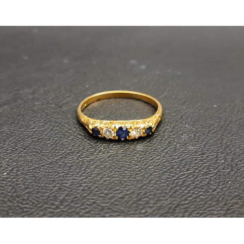 36 - GRADUATED DIAMOND AND SAPPHIRE FIVE STONE RING
the sapphires totalling approximately 0.2cts and the ... 