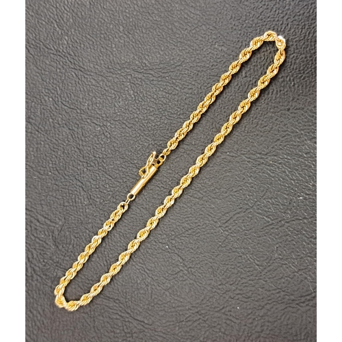 56 - FOURTEEN CARAT GOLD ROPE TWIST CHAIN BRACELET
18.3cm long and 3.3 grams