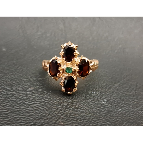 109 - GARNET AND EMERALD CLUSTER RING
the four oval cut garnets each approximately 0.35cts around a small ... 