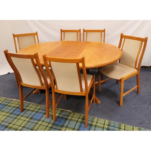 533 - MID 20th CENTURY DANISH TEAK DINING TABLE AND SIX CHAIRS
the table with one additional leaf and rais... 