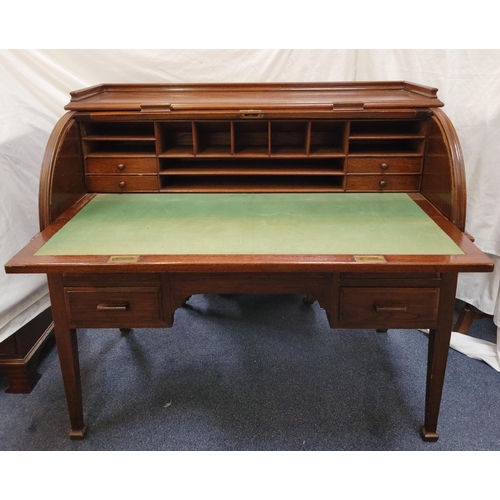 611 - TEAK ROLL TOP CYLINDER DESK
circa 1930s, the revolving cylindrical top opening to reveal a fitted in... 