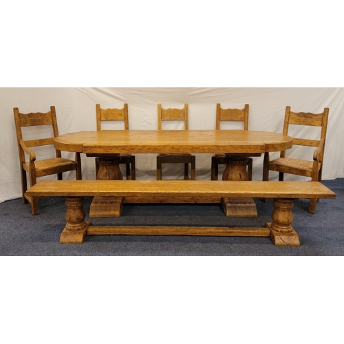 621 - LARGE RUSTIC CONTEMPORARY OAK MONASTRY TABLE WITH A PAIR OF CARVERS, THREE CHAIRS AND BENCH
The tabl... 