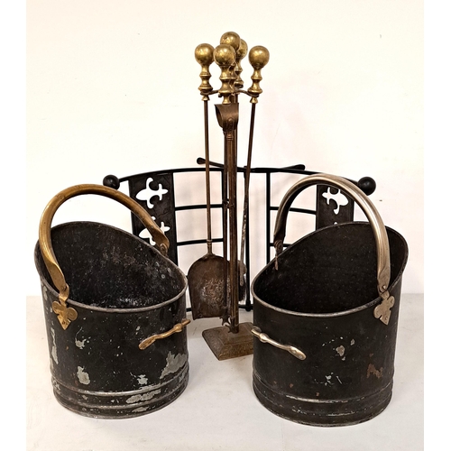 306 - BRASS FIRESIDE COMPANION SET
together with a pair of black coal buckets and a wrought iron black fol... 