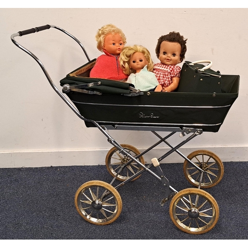 447 - VINTAGE SILVER CROSS DOLL'S PRAM
in green and with matching bag, with two Palitoy dolls, one dated 1... 