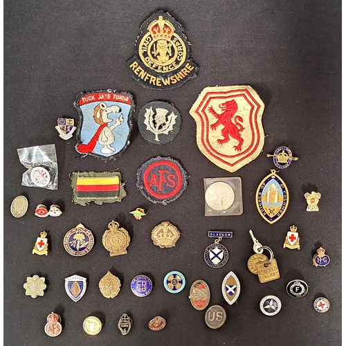 495 - SELECTION OF MILITARY AND OTHER BADGES
including military, sporting and religious; together with a s... 