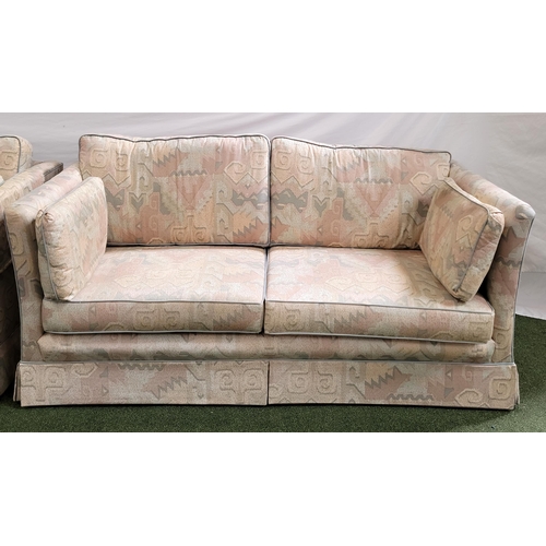 541 - PAIR OF TWO SEAT SOFAS
both in patterned upholstery and with loose cushions, one with sofa bed mecha... 